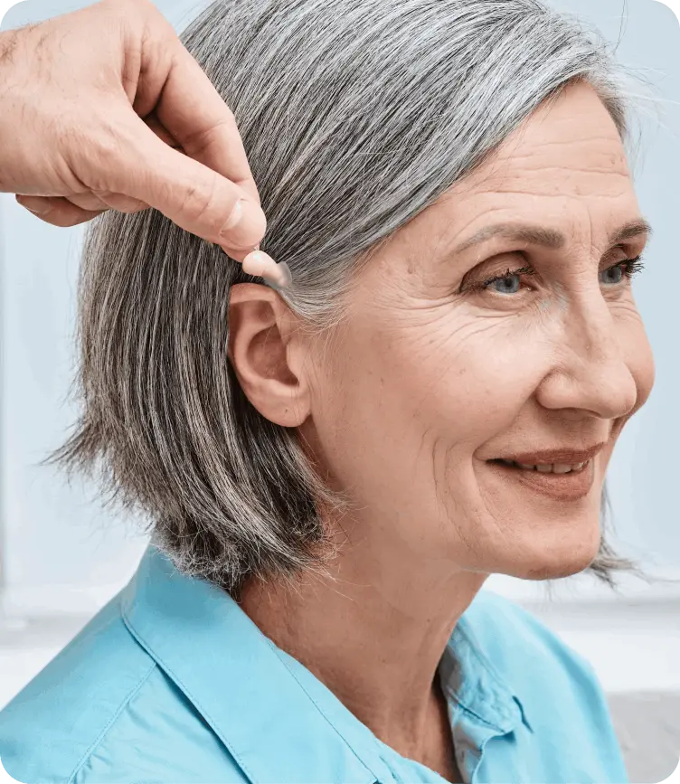 Women using Audien hearing aids